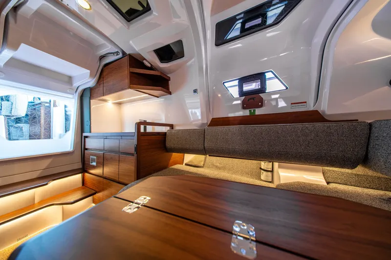 Slide: The Image of Luxurious interior of 2027 Axopar 38 Cross Cabin with modern wood and fabric finishes. - 34