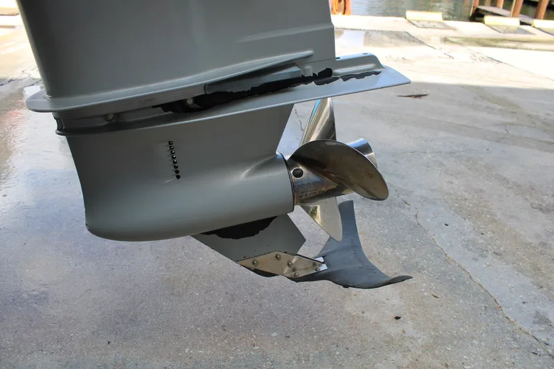 Slide: The Image of Close-up of a 2021 Monterey 255SS Super Sport boat propeller on a concrete surface. - 11