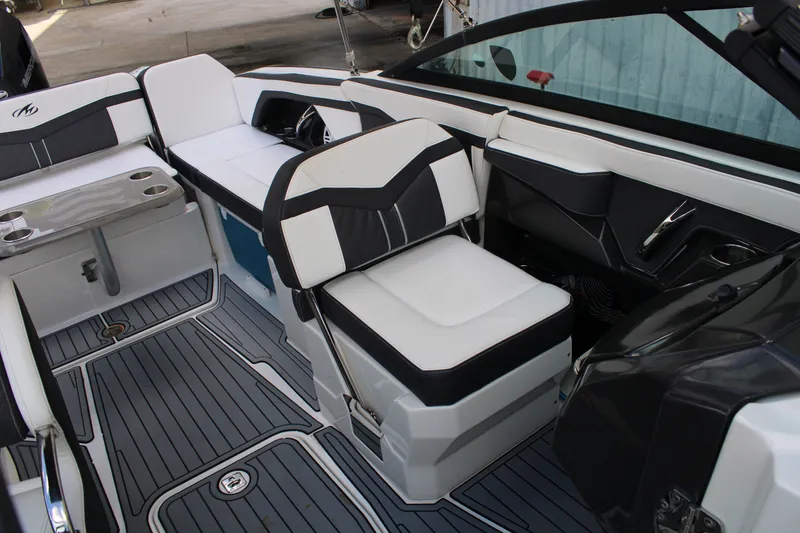Slide: The Image of Interior of a 2021 Monterey 255SS Super Sport boat with sleek seating and modern design. - 25