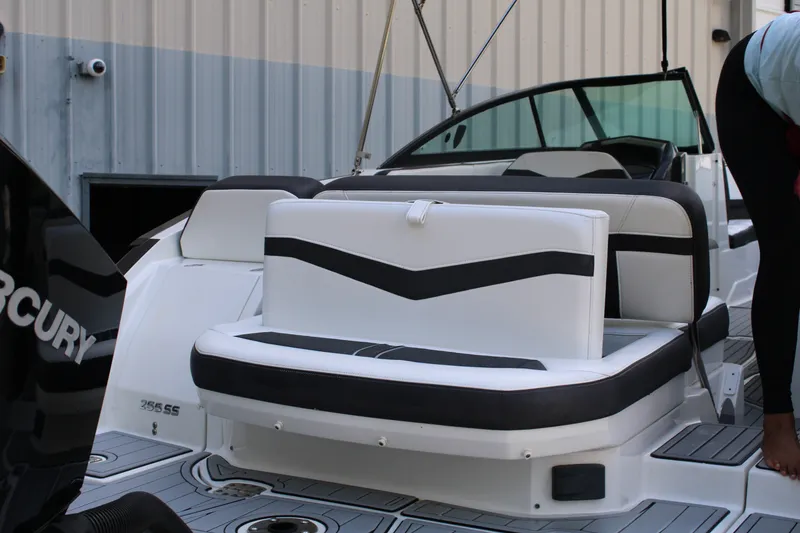 Slide: The Image of 2021 Monterey 255SS Super Sport boat interior with white and black seating. - 15