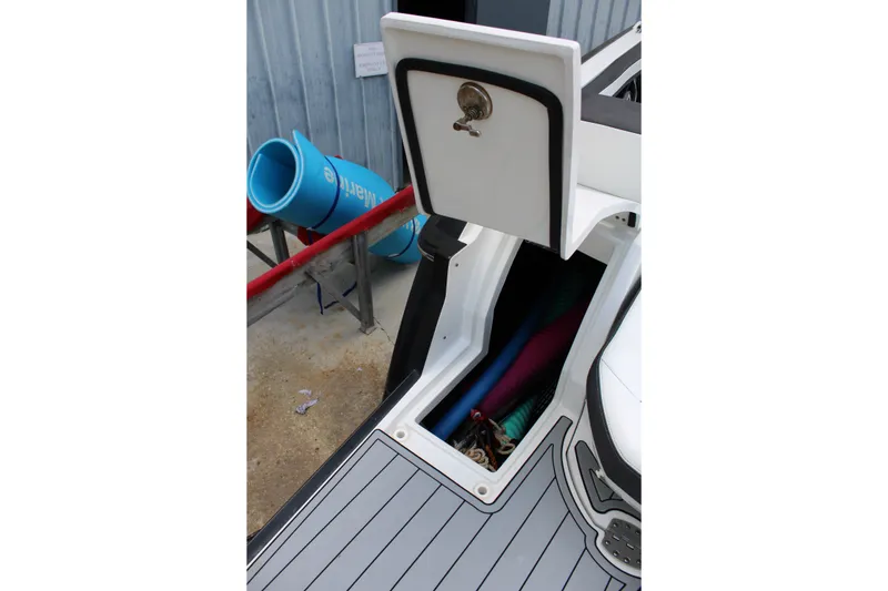 Slide: The Image of 2021 Monterey 255SS Super Sport boat storage compartment with open hatch, showcasing interior space. - 41
