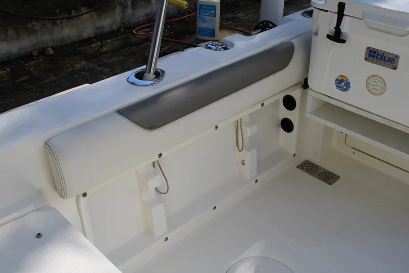 Slide: The Image of Interior view of 2021 World Cat 255 DC boat, featuring seating and storage area. - 27