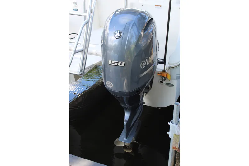 Slide: The Image of Yamaha 150 outboard motor on a 2021 World Cat 255 DC boat. - 41