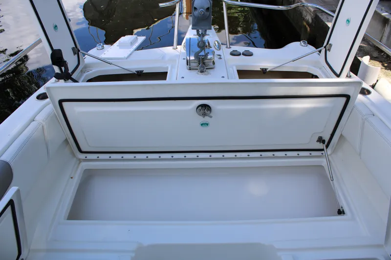 Slide: The Image of 2021 World Cat 255 DC boat storage compartment, open and spacious design. - 15