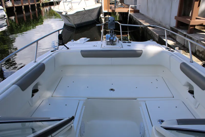 Slide: The Image of 2021 World Cat 255 DC boat interior with spacious seating and sleek design. - 14