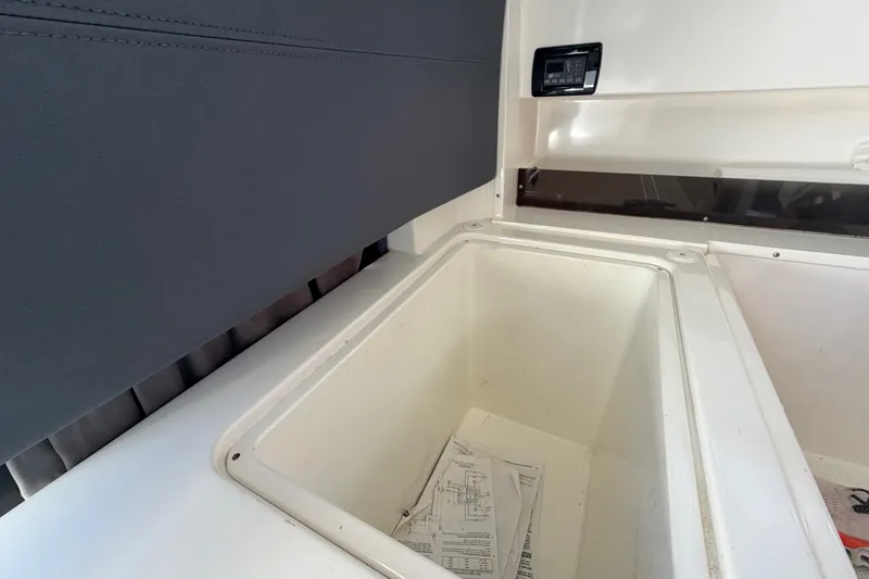 Slide: The Image of Storage compartment in 2024 Sardine Marine 34 boat, featuring a sleek interior design. - 16
