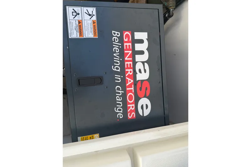 Slide: The Image of Mase generator on Sardine Marine 34, 2024 model, with "Believing in change" slogan. - 35