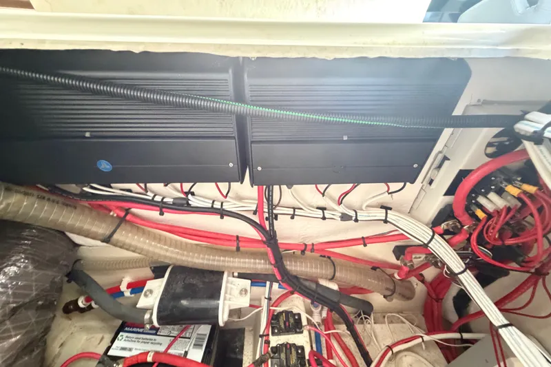 Slide: The Image of Electrical wiring and components inside a 2024 Sardine Marine 34 boat. - 17