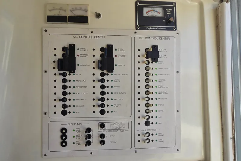 Slide: The Image of Electrical control panel on a 1994 Mainship 40 Sedan Bridge boat. - 34