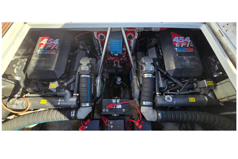 Slide: The Image of Engine compartment of a 1994 Mainship 40 Sedan Bridge with twin 454 EFI engines. - 35