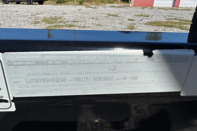 Slide: The Image of Label on a 2017 Regal 28 Express trailer, showing VIN and compliance details. - 100