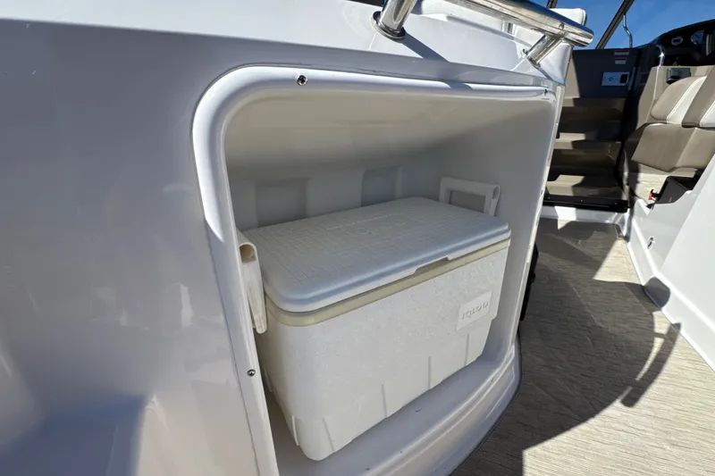Slide: The Image of Storage compartment with cooler on 2017 Regal 28 Express boat. - 27
