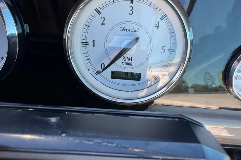 Slide: The Image of Close-up of a 2017 Regal 28 Express tachometer showing 416.5 RPM. - 47