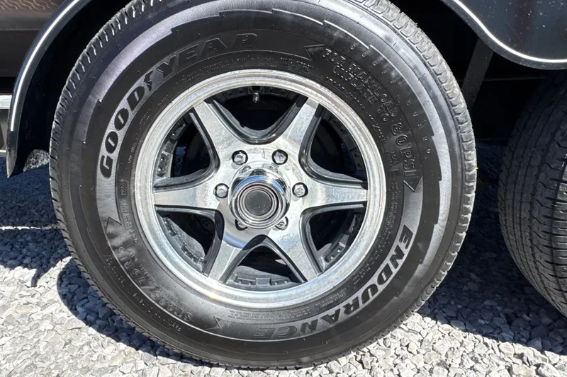 Slide: The Image of Close-up of a Goodyear Endurance tire on a 2017 Regal 28 Express. - 102
