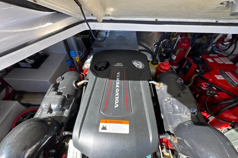Slide: The Image of Engine compartment of a 2017 Regal 28 Express with Volvo Penta motor. - 63