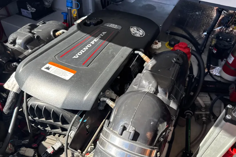 Slide: The Image of Engine compartment of a 2017 Regal 28 Express boat with Volvo Penta engine. - 73