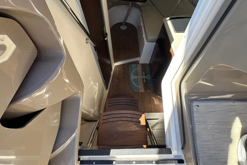 Slide: The Image of Interior view of 2017 Regal 28 Express boat, featuring sleek design and modern finishes. - 76