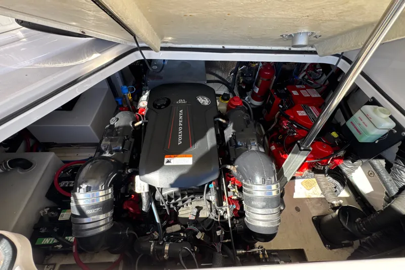 Slide: The Image of Engine compartment of a 2017 Regal 28 Express boat with Volvo Penta engine. - 62