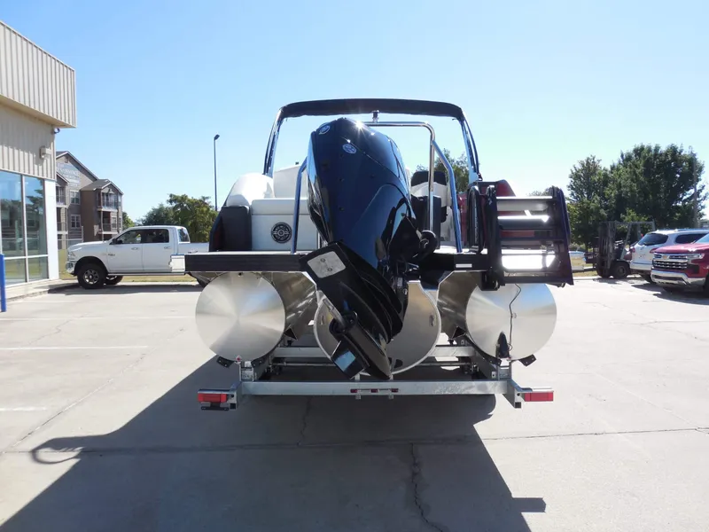 Slide: The Image of The image shows an Evotti 525CSA boat from 2027 on a trailer in a parking lot. - 4