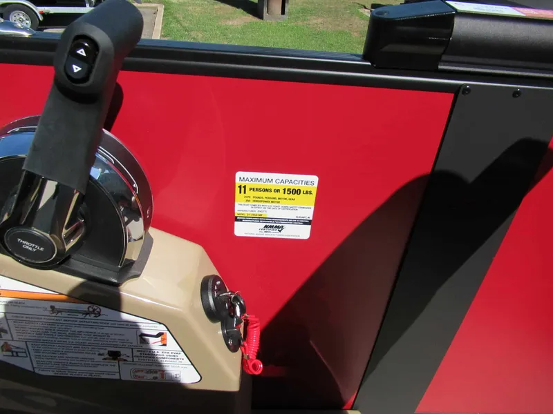 Slide: The Image of Close-up of a boat control system with capacity label. - 9