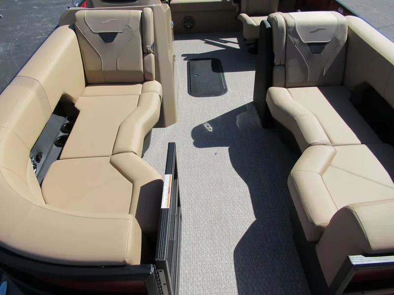 Slide: The Image of The image shows the interior of a 2027 Evotti 521CS with beige upholstered seating. - 6