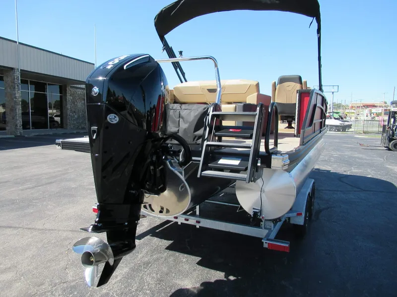 Slide: The Image of The image shows a 2027 Evotti 521CS pontoon boat with an outboard motor and a sunshade. - 4