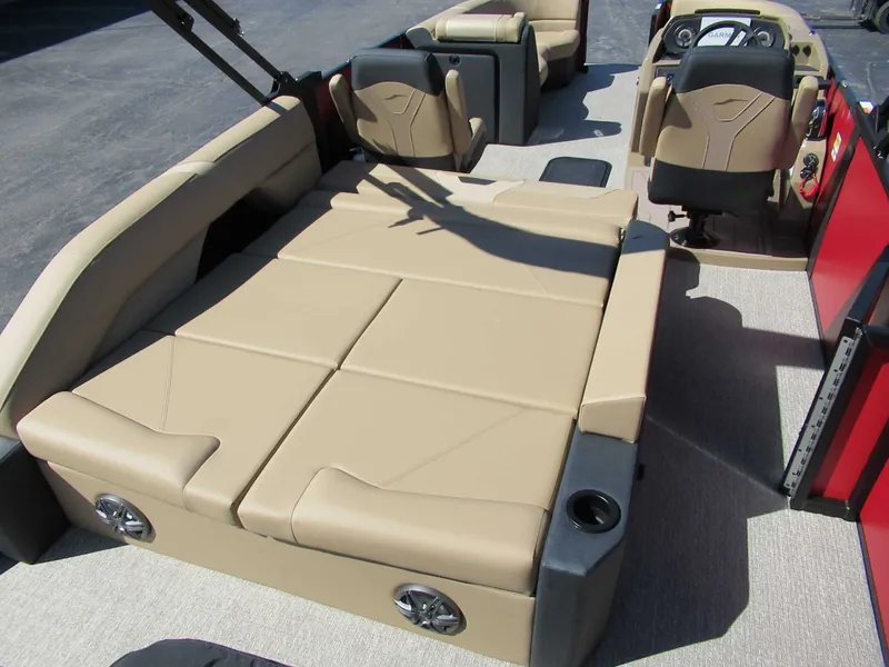 Slide: The Image of The image shows the interior of a 2027 Evotti 521CS with beige leather seating. - 10