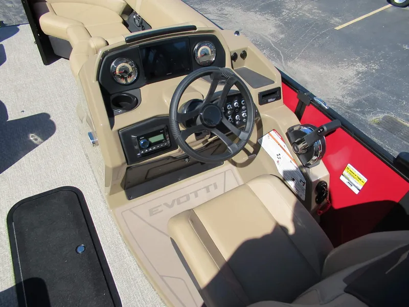 Slide: The Image of The image shows the cockpit of a 2027 Evotti 521CS with a modern steering wheel and instruments. - 8