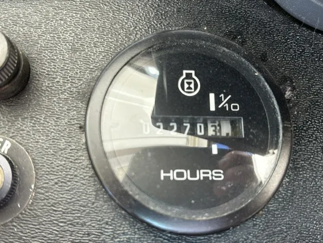 Slide: The Image of Close-up of an hour meter showing 2270.3 hours on a 1979 Mainship 34 Trawler. - 25