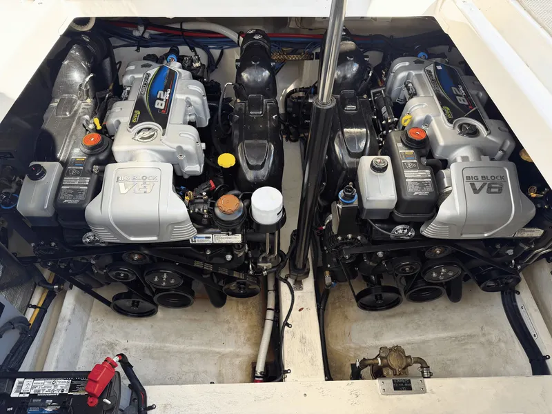 Slide: The Image of The engine compartment features two powerful V8 engines with clean wiring and easy access. - 22