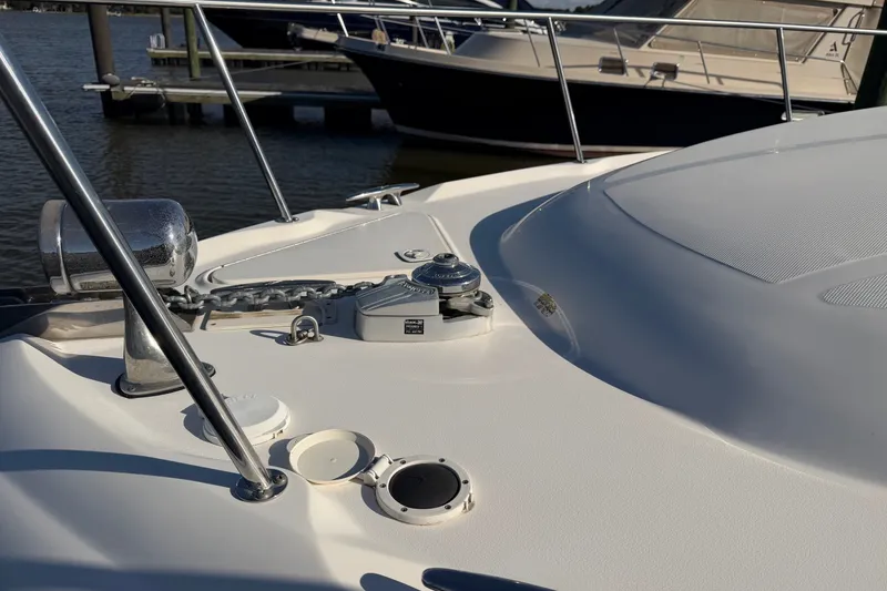 Slide: The Image of Bow of 2002 Sea Ray 340 Sundancer with anchor chain and railing. - 5