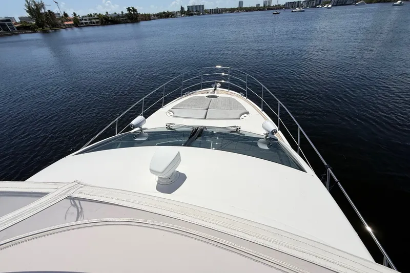 Slide: The Image of Front view of a 2015 Azimut 54 yacht on calm waters. - 31