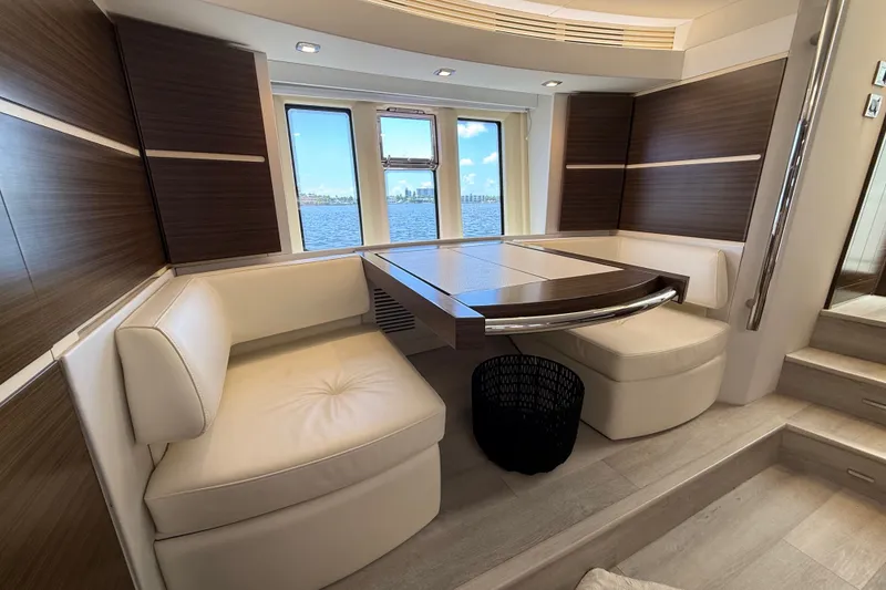 Slide: The Image of Luxurious interior of 2015 Azimut 54 yacht with elegant seating and panoramic windows. - 89