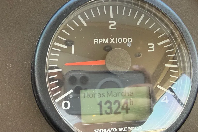 Slide: The Image of Close-up of Volvo Penta tachometer showing 1324 hours on Azimut 54, 2015 model. - 101