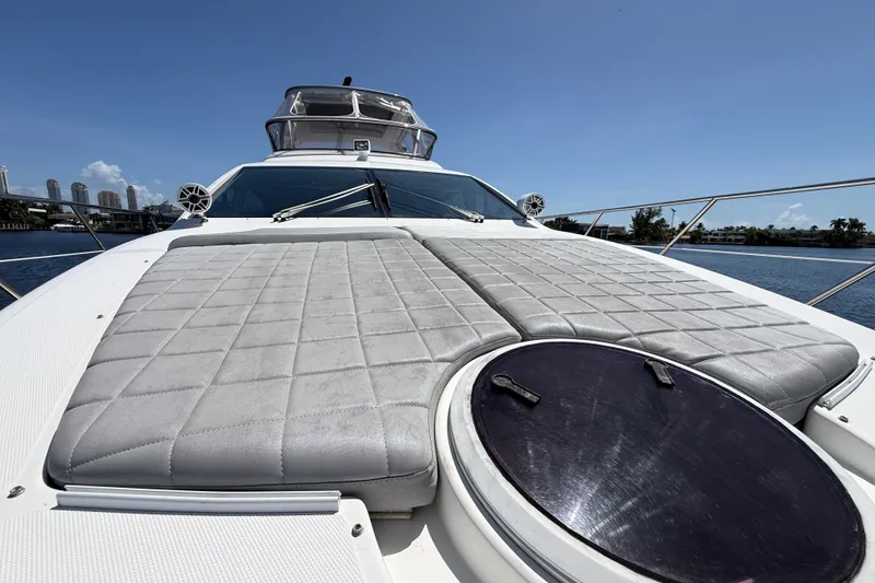 Slide: The Image of Luxurious 2015 Azimut 54 yacht with spacious sunbathing deck and sleek design on open water. - 16
