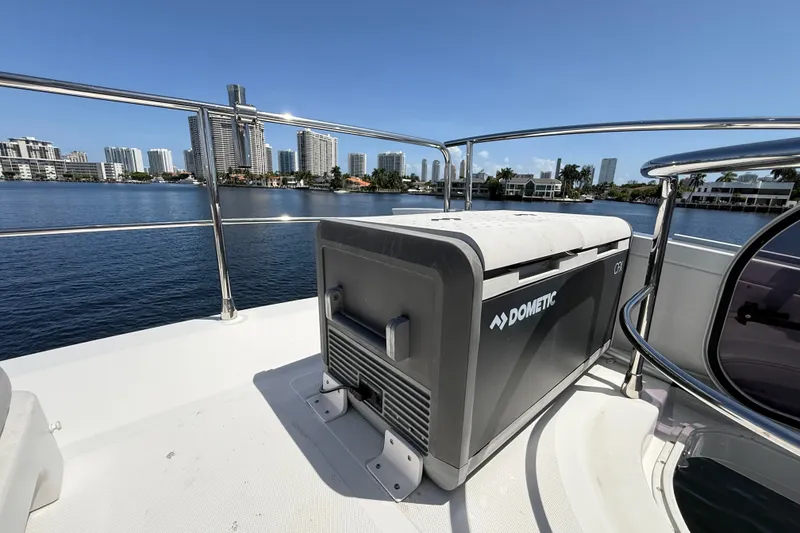 Slide: The Image of Azimut 54 yacht deck with Dometic cooler, city skyline in background, 2015 model. - 26