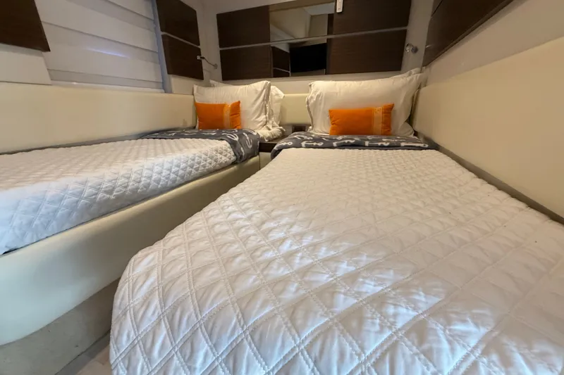 Slide: The Image of Interior of 2015 Azimut 54 yacht with twin beds and modern decor. - 85