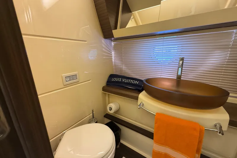 Slide: The Image of Luxurious bathroom in 2015 Azimut 54 yacht with modern sink and elegant decor. - 93
