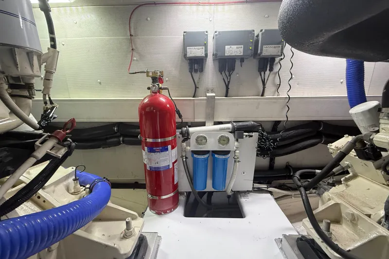 Slide: The Image of Engine room of 2015 Azimut 54 yacht with fire extinguisher and filtration system. - 114