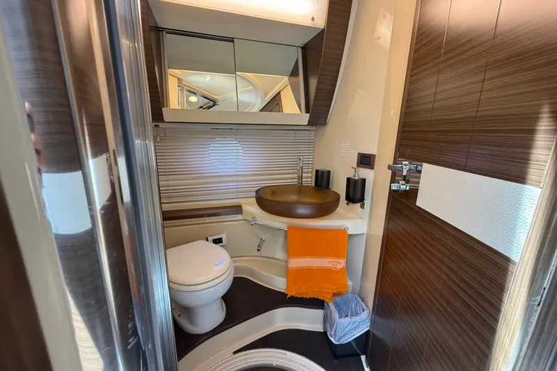 Slide: The Image of Luxurious bathroom interior of a 2015 Azimut 54 yacht with modern fixtures. - 99