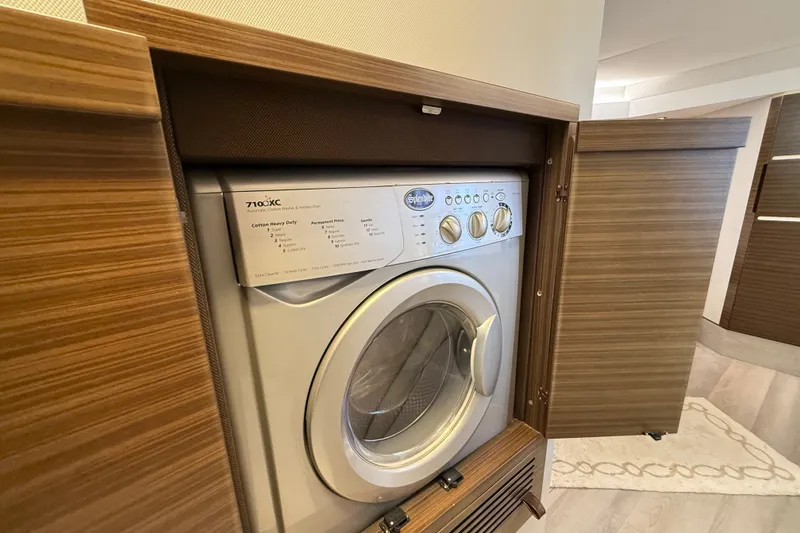 Slide: The Image of Built-in washer in 2015 Azimut 54 yacht, wooden cabinet enclosure. - 86