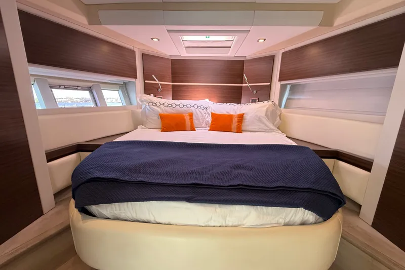 Slide: The Image of Luxurious bedroom interior of 2015 Azimut 54 yacht with modern design and cozy bedding. - 81