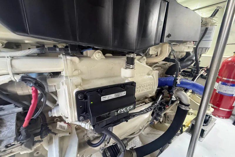 Slide: The Image of Engine room of a 2015 Azimut 54 yacht, featuring Volvo Penta components. - 113