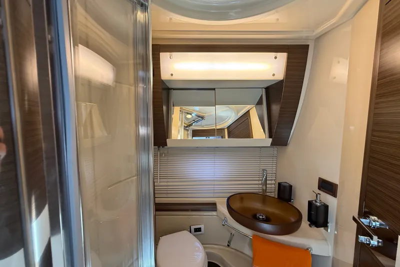 Slide: The Image of Luxurious bathroom interior of 2015 Azimut 54 yacht with modern fixtures and elegant design. - 98