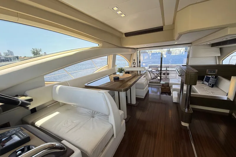 Slide: The Image of Luxurious interior of 2015 Azimut 54 yacht with elegant seating and dining area. - 79
