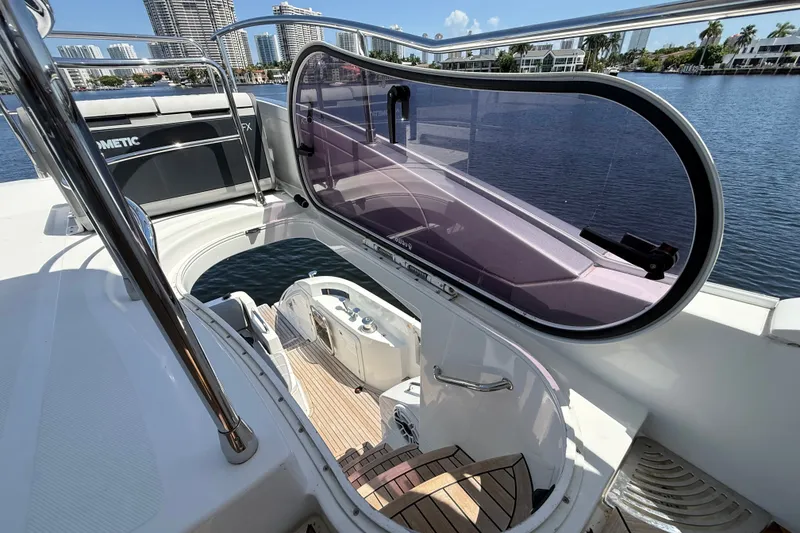 Slide: The Image of 2015 Azimut 54 yacht deck with modern design and waterfront view. - 23