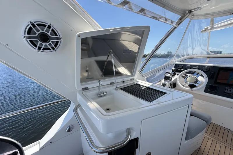 Slide: The Image of Luxury yacht Azimut 54 cockpit with grill and steering, 2015 model. - 40