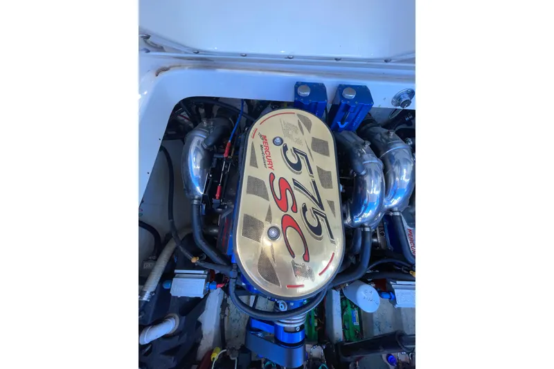 Slide: The Image of Engine compartment of a 2002 Fountain 35 Lightning boat with Mercury 525 EFI engine. - 13