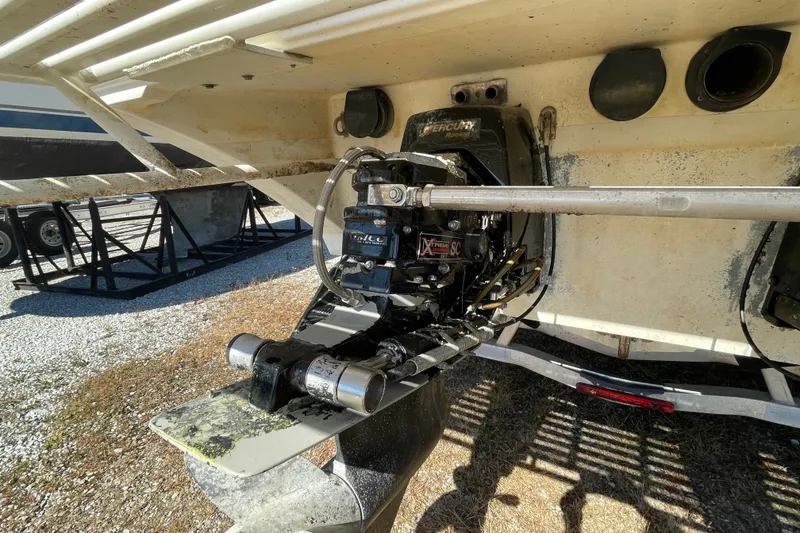 Slide: The Image of Rear view of a 2002 Fountain 35 Lightning boat engine and propeller system. - 32