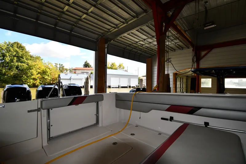 Slide: The Image of Interior view of 2009 Donzi 38 ZFX Open boat in a covered dock. - 24